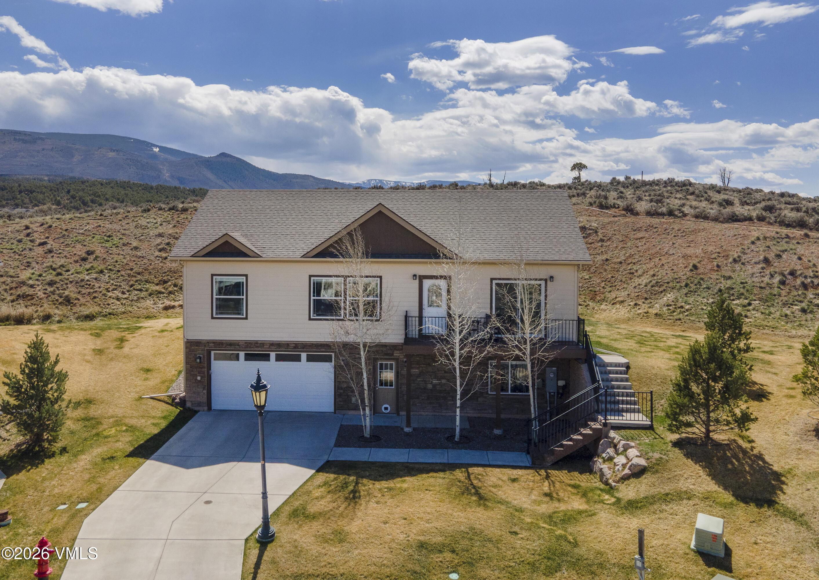 67 Maverick Court Gypsum, CO 81637 - Photo 40 of 40 a view of a house with swimming pool and sitting area