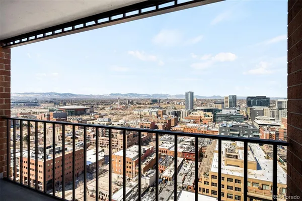 a view of city from a balcony