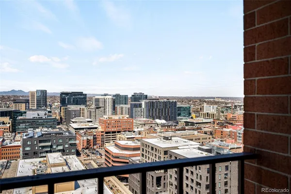 a view of a city with tall buildings