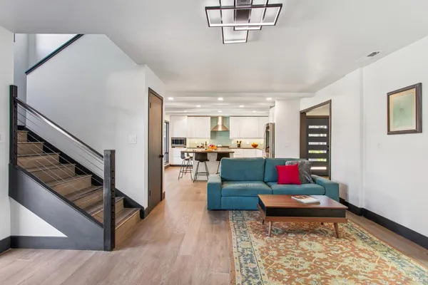 a living room with furniture and a window