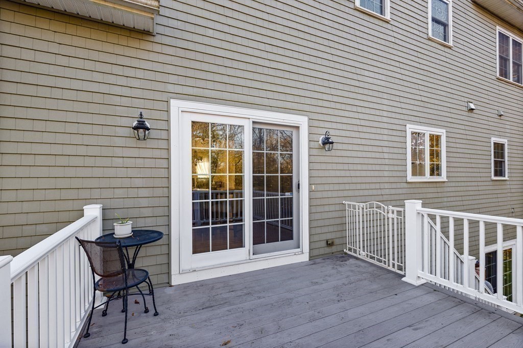 2050 Washington Street Canton, MA 02021 - Photo 29 of 35 a view of a house with a table and chair