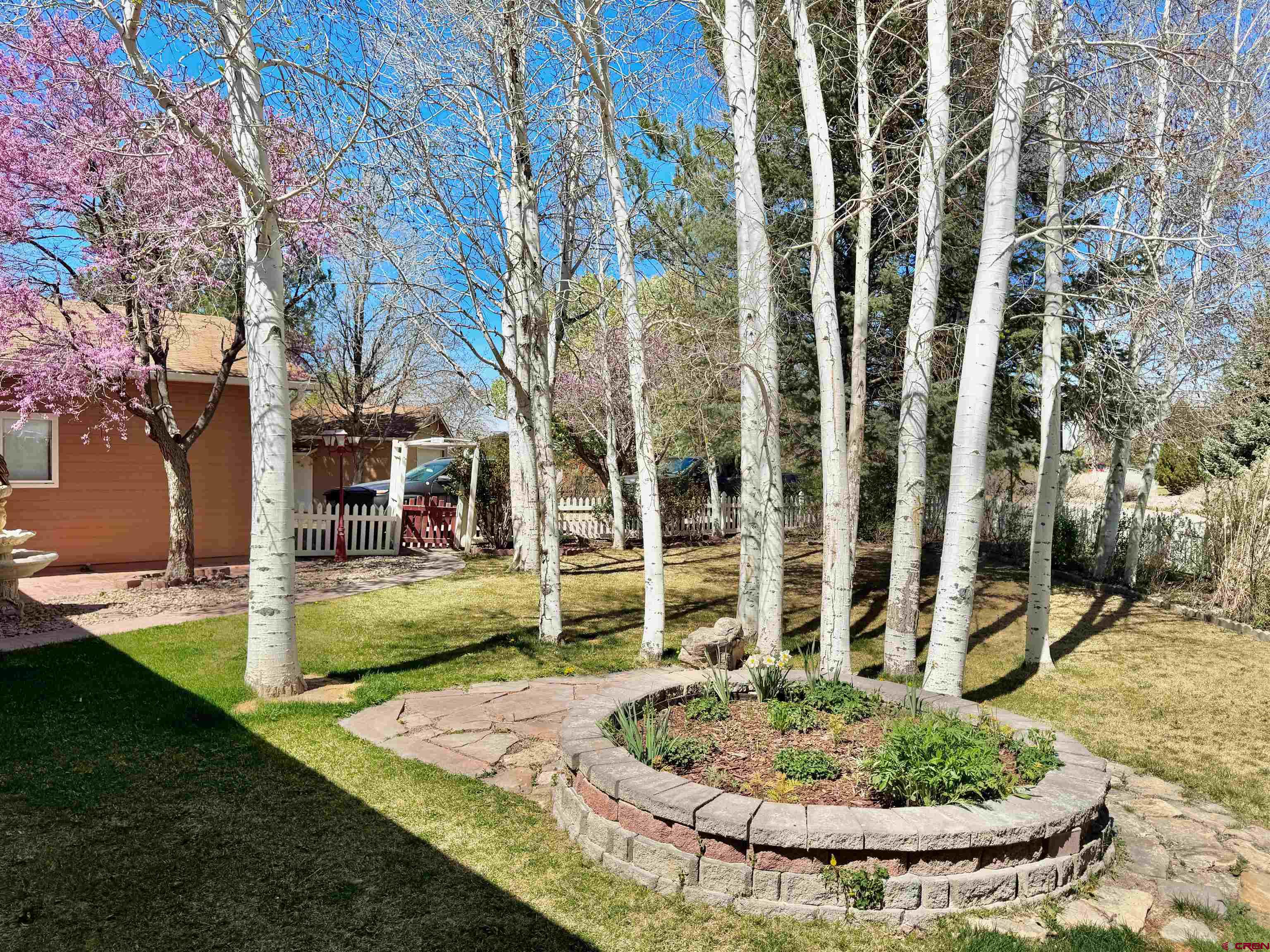 61460 Epitaph Road Montrose, CO 81403 - Photo 35 of 45 a view of a house with backyard