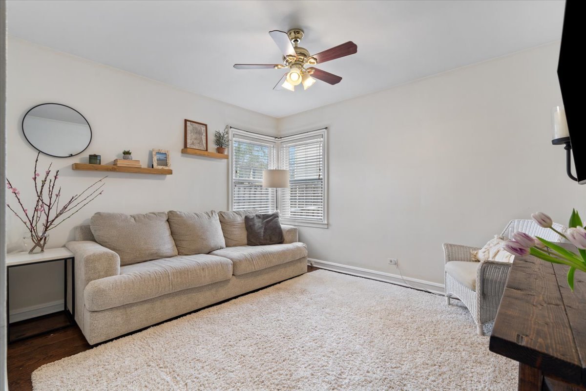 1104 South Lincoln Avenue Park Ridge, IL 60068 - Photo 17 of 37 a living room with furniture and a window