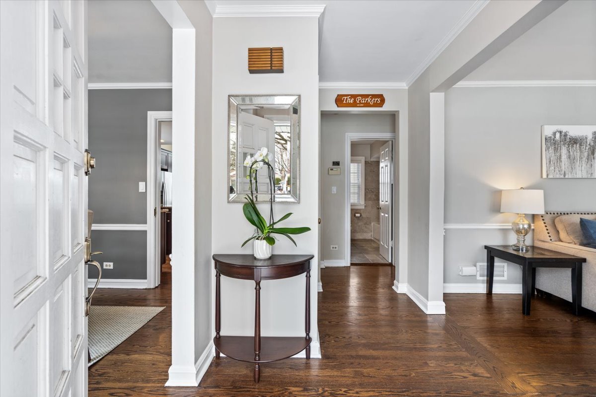 1104 South Lincoln Avenue Park Ridge, IL 60068 - Photo 2 of 37 a living room with furniture and a wooden floor