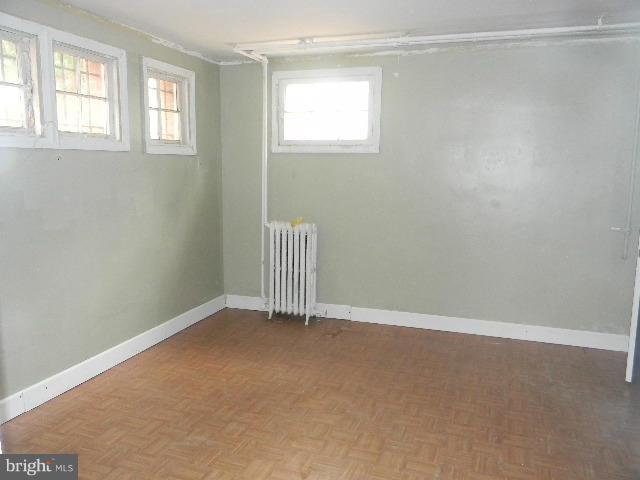 77 Forrester Street Southwest Washington, DC 20032 - Photo 15 of 22 an empty room with windows