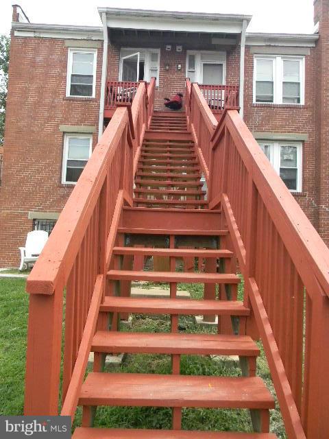 77 Forrester Street Southwest Washington, DC 20032 - Photo 21 of 22 a view of a building with wooden floor and white walls