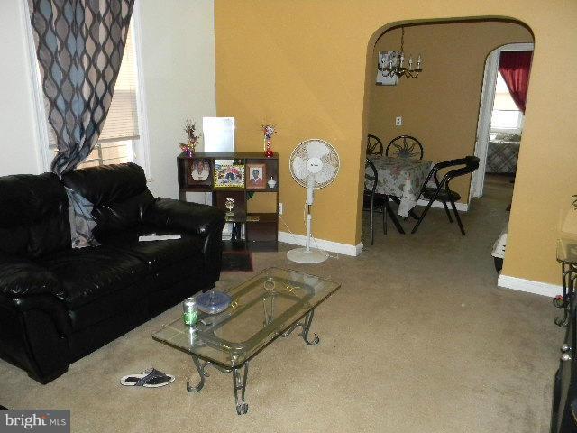 77 Forrester Street Southwest Washington, DC 20032 - Photo 4 of 22 a living room with furniture