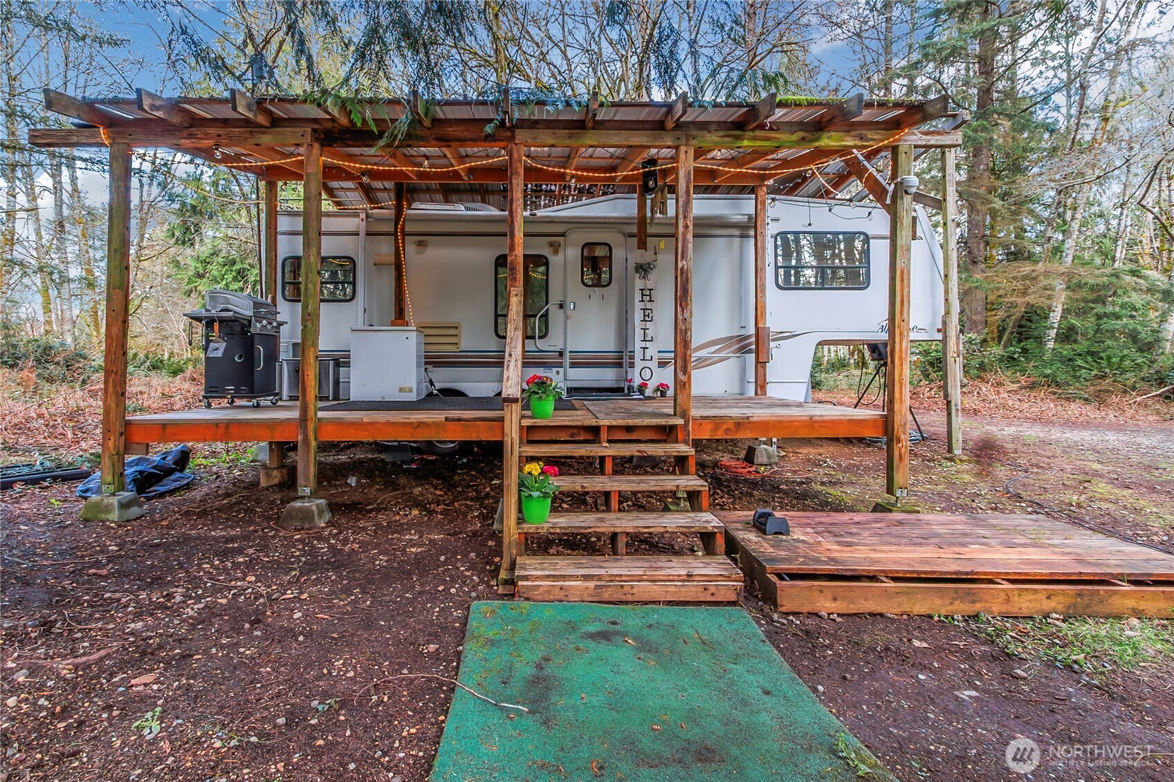 17124 80th Street Southwest Longbranch, WA 98351 - Photo 6 of 37 front view of a house with a yard balcony and sitting area