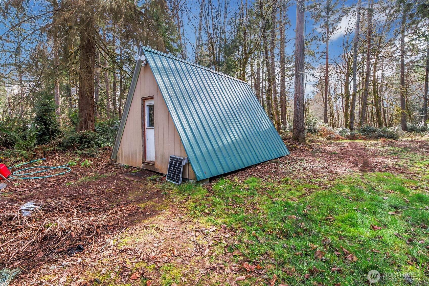 17124 80th Street Southwest Longbranch, WA 98351 - Photo 7 of 37 a view of a backyard with jacuzzi