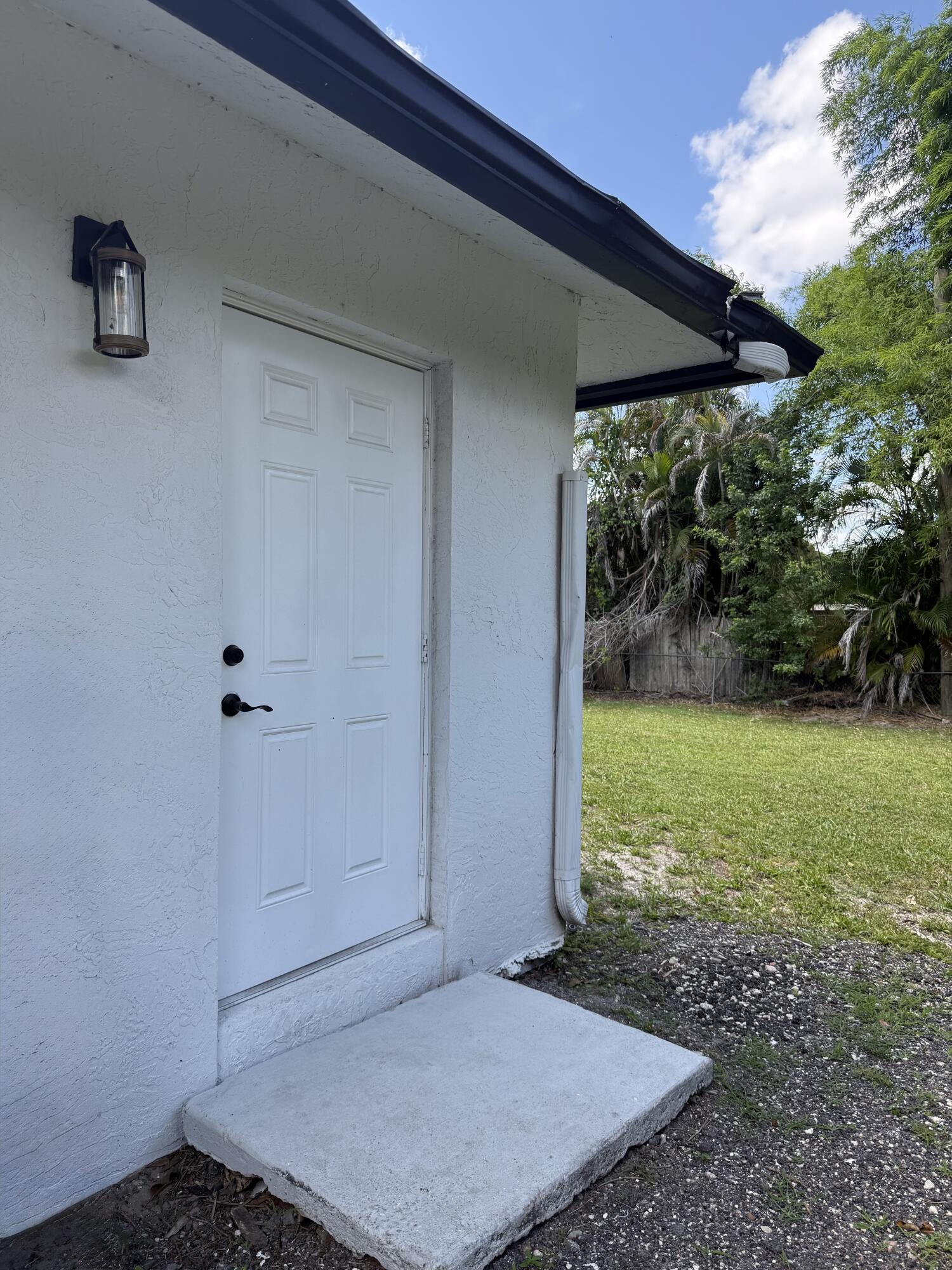 14523 Flamingo Road Loxahatchee Groves, FL 33470 - Photo 44 of 50 a view of a backyard