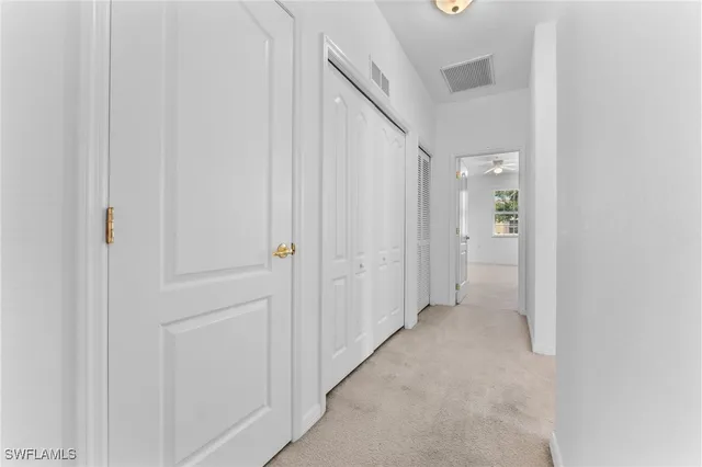 a view of a storage & utility room with washer and dryer