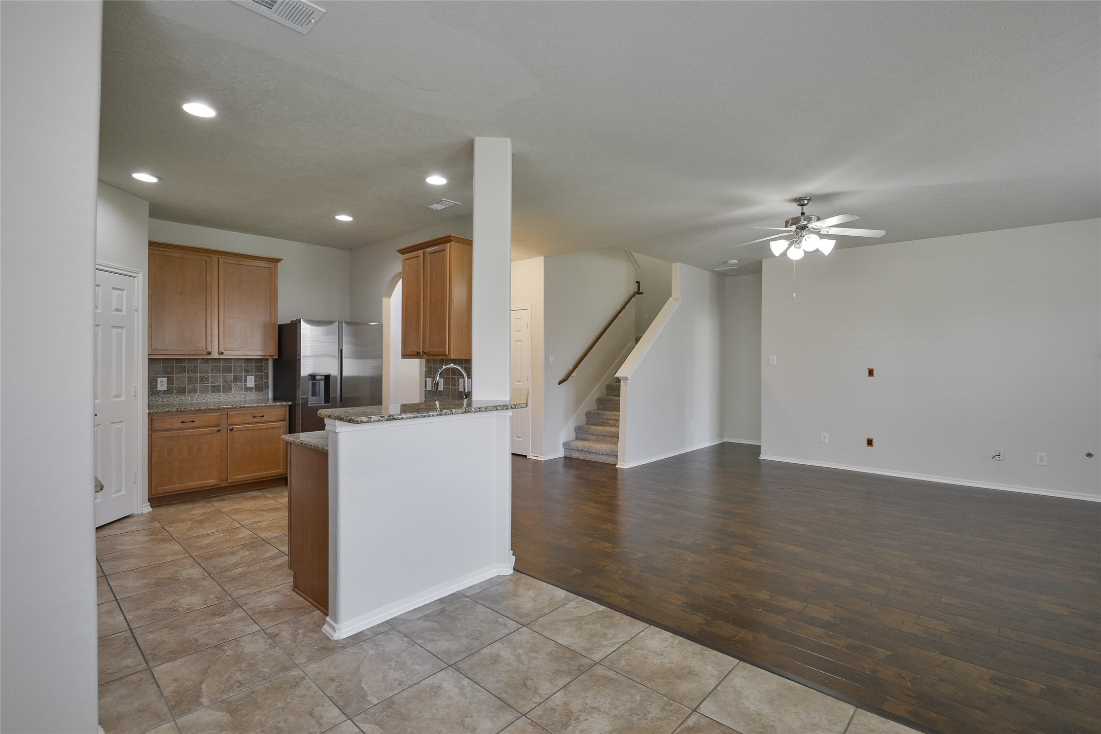 3618 Orchard Valley Lane Spring, TX 77386 - Photo 14 of 39 a view of kitchen with furniture and refrigerator