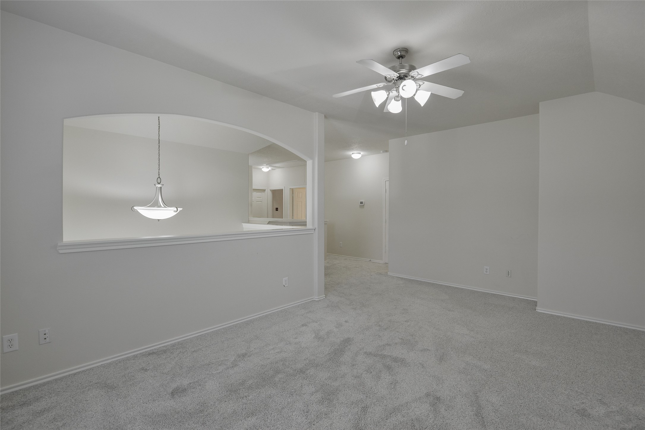 3618 Orchard Valley Lane Spring, TX 77386 - Photo 24 of 39 a view of a chandelier fan and entryway