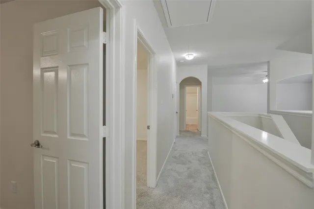 a view of hallway with shower