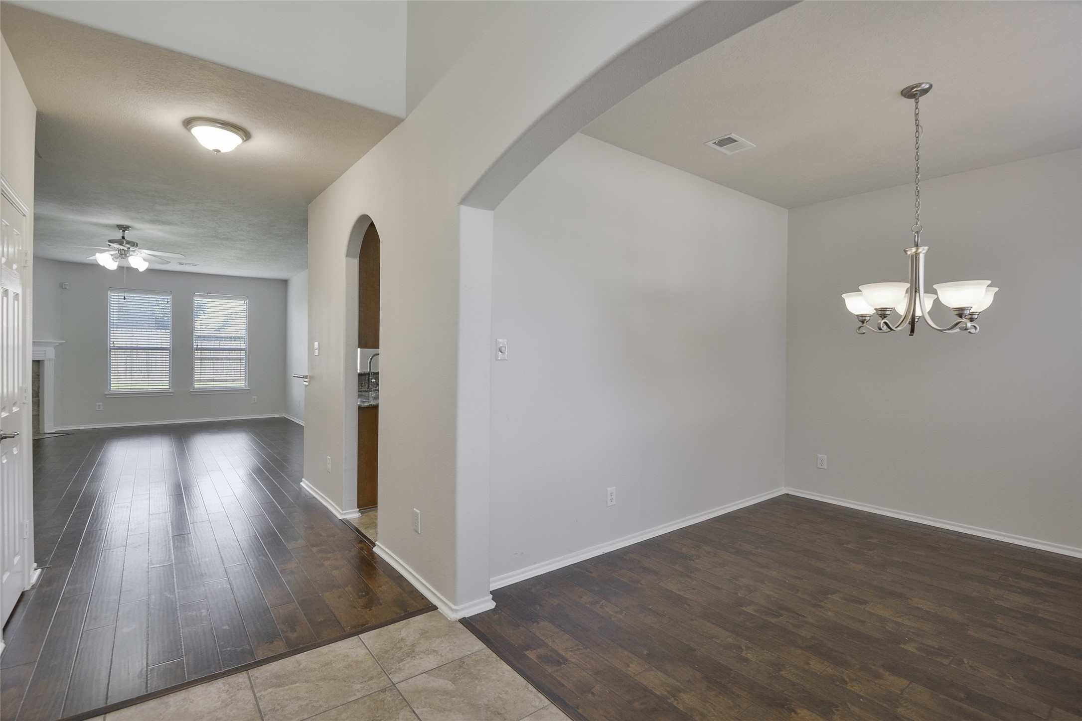 3618 Orchard Valley Lane Spring, TX 77386 - Photo 4 of 39 wooden floor in an empty room with a window