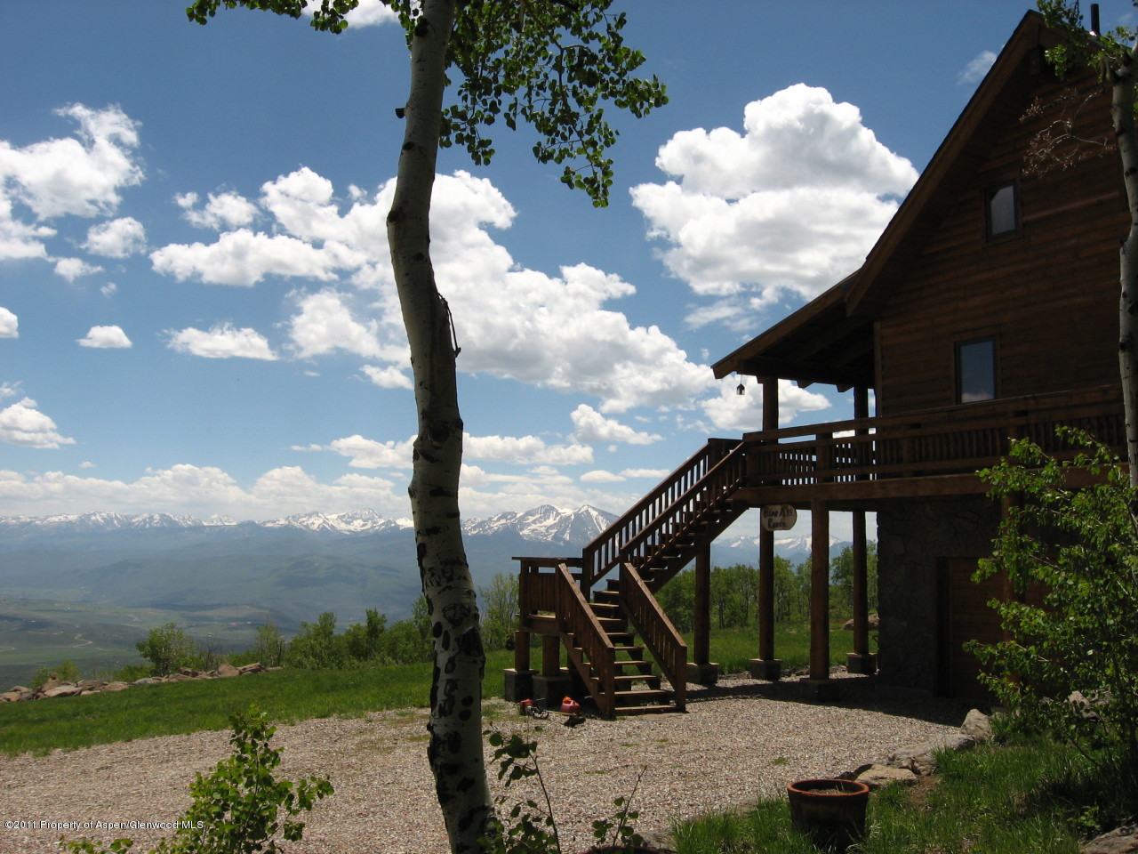 630 Foster Ridge Road Glenwood Springs, CO 81601 - Photo 3 of 27 a view of a building with a yard