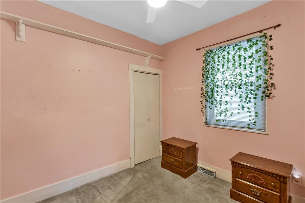 1909 Freeport Road New Kensington, PA 15068 - Photo 15 of 25 a room with a window and a couch