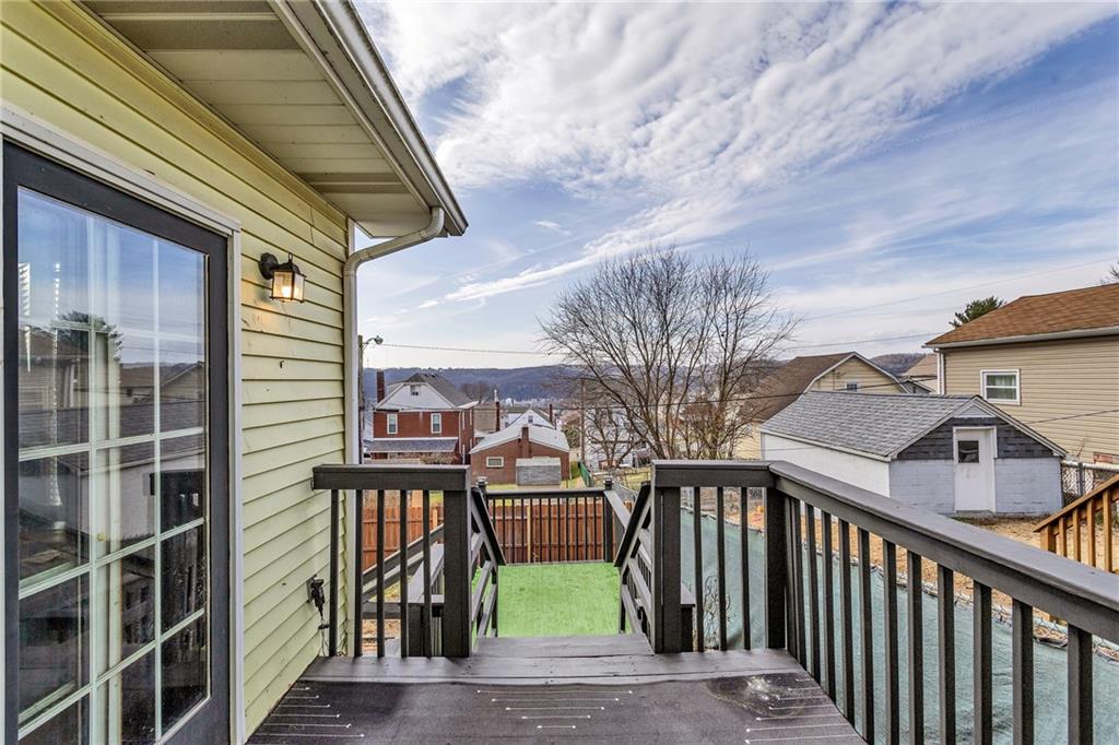 1909 Freeport Road New Kensington, PA 15068 - Photo 20 of 25 a view of a brick house with many windows