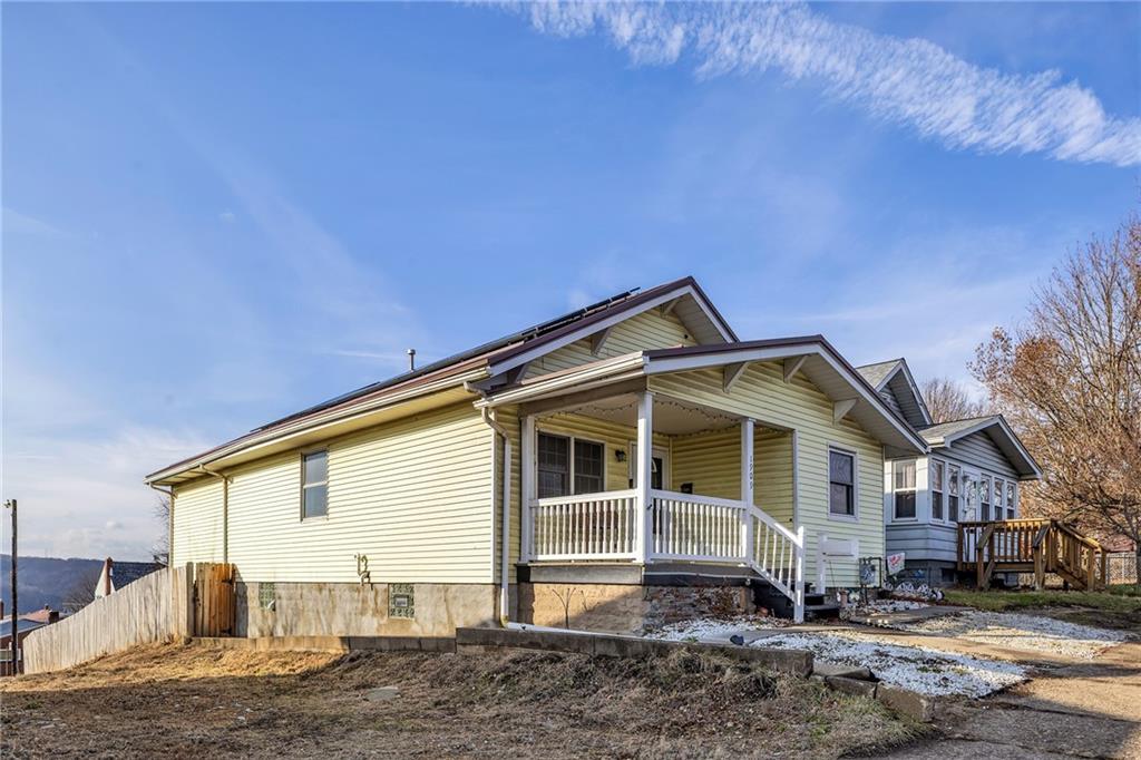 1909 Freeport Road New Kensington, PA 15068 - Photo 2 of 25 a front view of a house with a yard