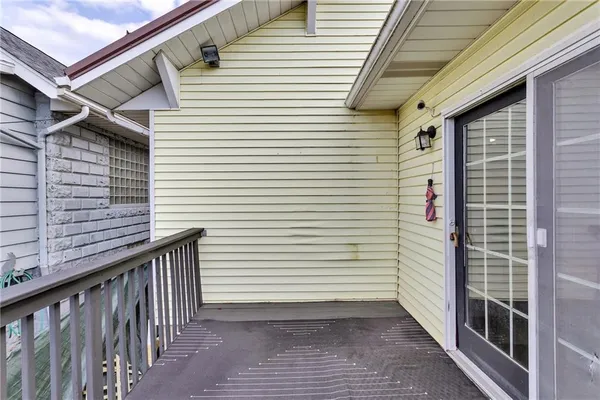 a view of a porch with a door