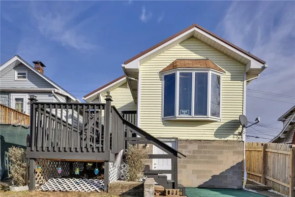 a front view of a house with a balcony