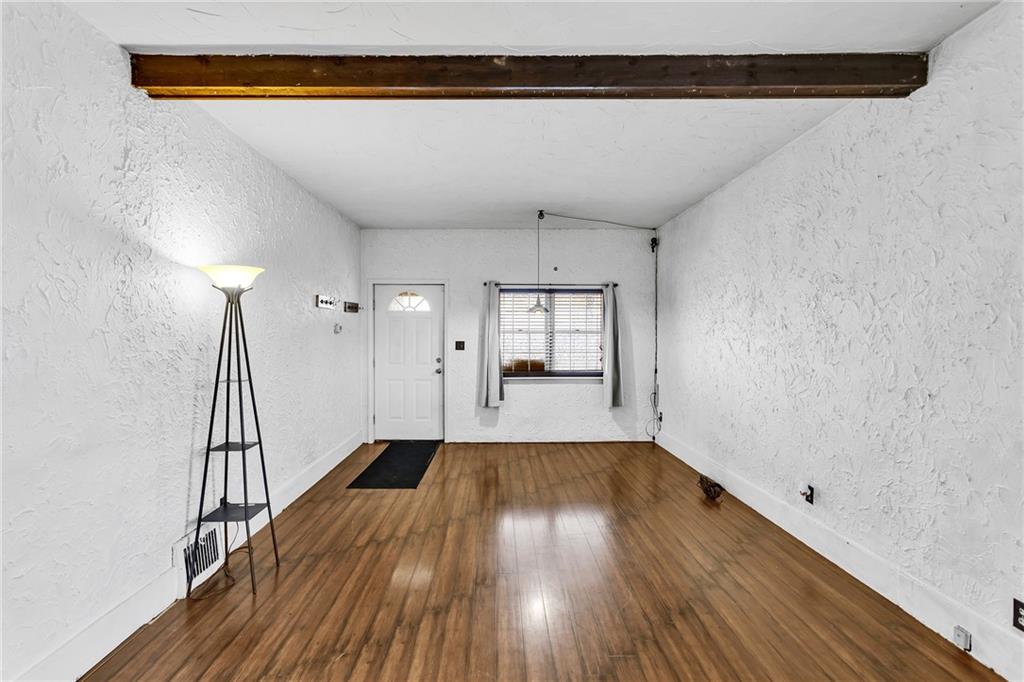 1909 Freeport Road New Kensington, PA 15068 - Photo 5 of 25 a view of a room with wooden floor and staircase