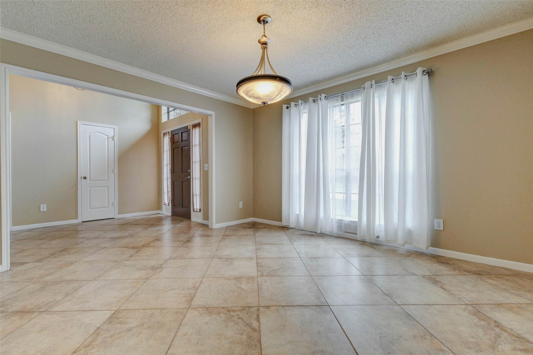 3107 Dulaney Road Houston, TX 77084 - Photo 6 of 50 a view of an empty room with a window