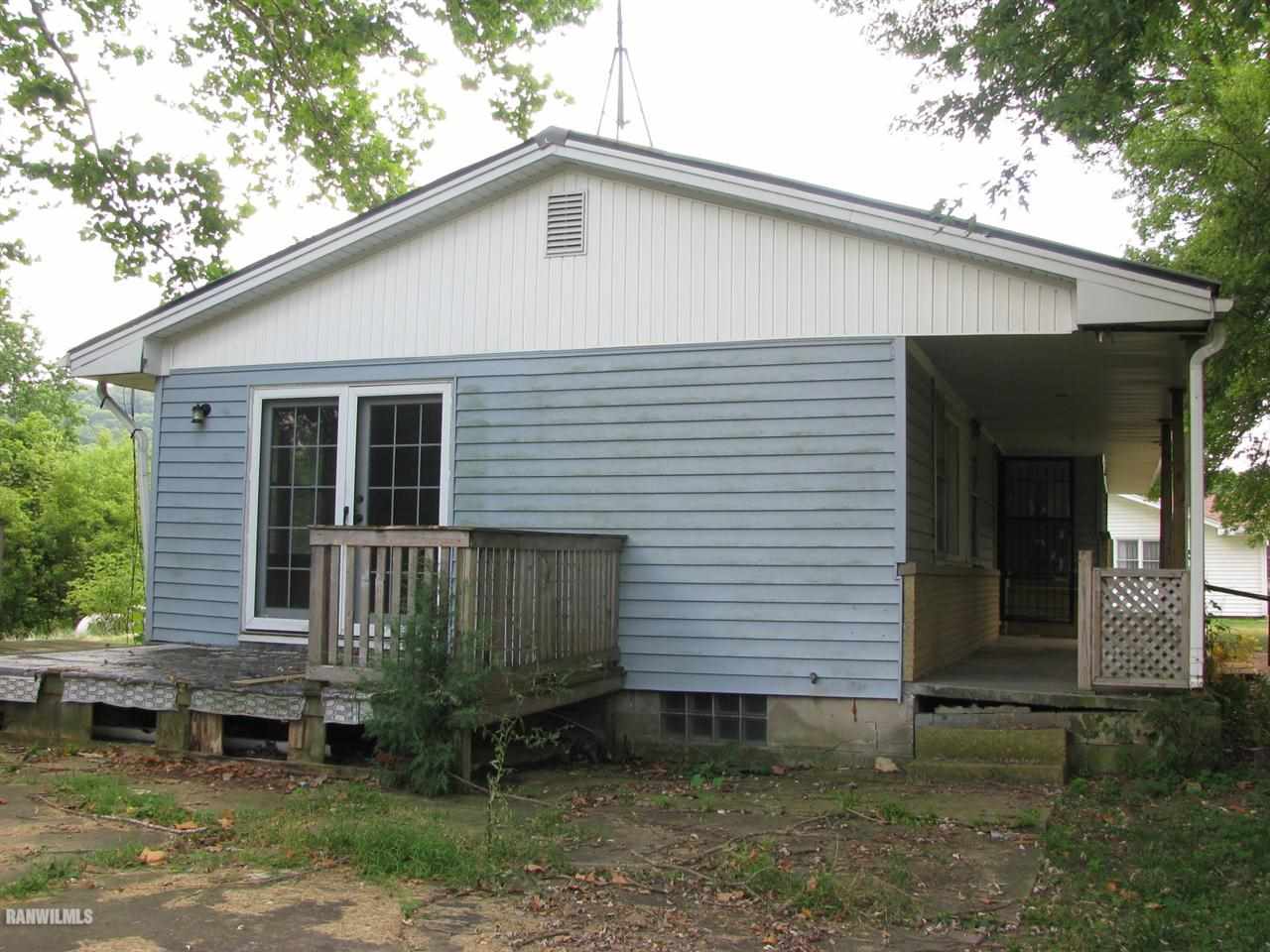 9681 South Il Route Hanover, IL 61041 - Photo 3 of 17 a view of a small house with backyard