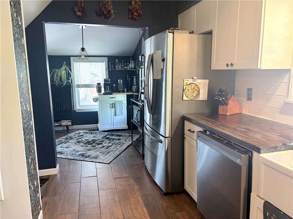 150 Stuart Avenue Arcadia, NY 14513 - Photo 5 of 25 Kitchen to Breakfast Nook