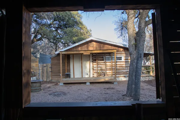 a house with trees in front of it