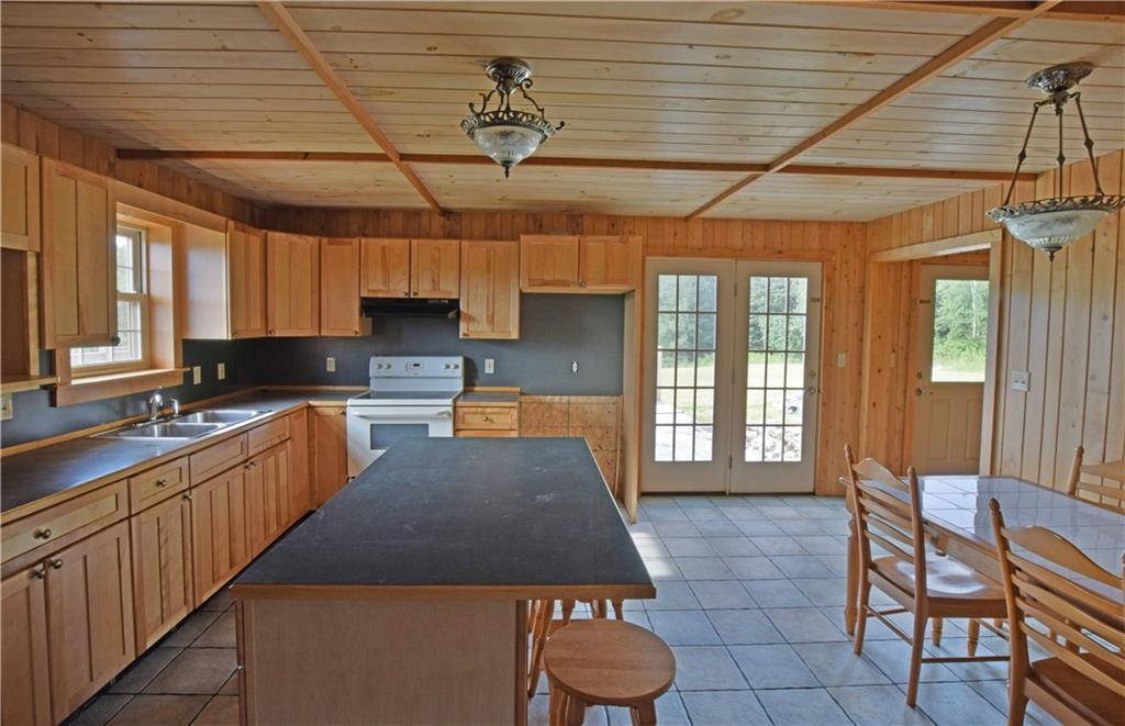 1092 Aroostook Road Wallagrass, ME 04781 - Photo 4 of 25 tile floors and lots of wood