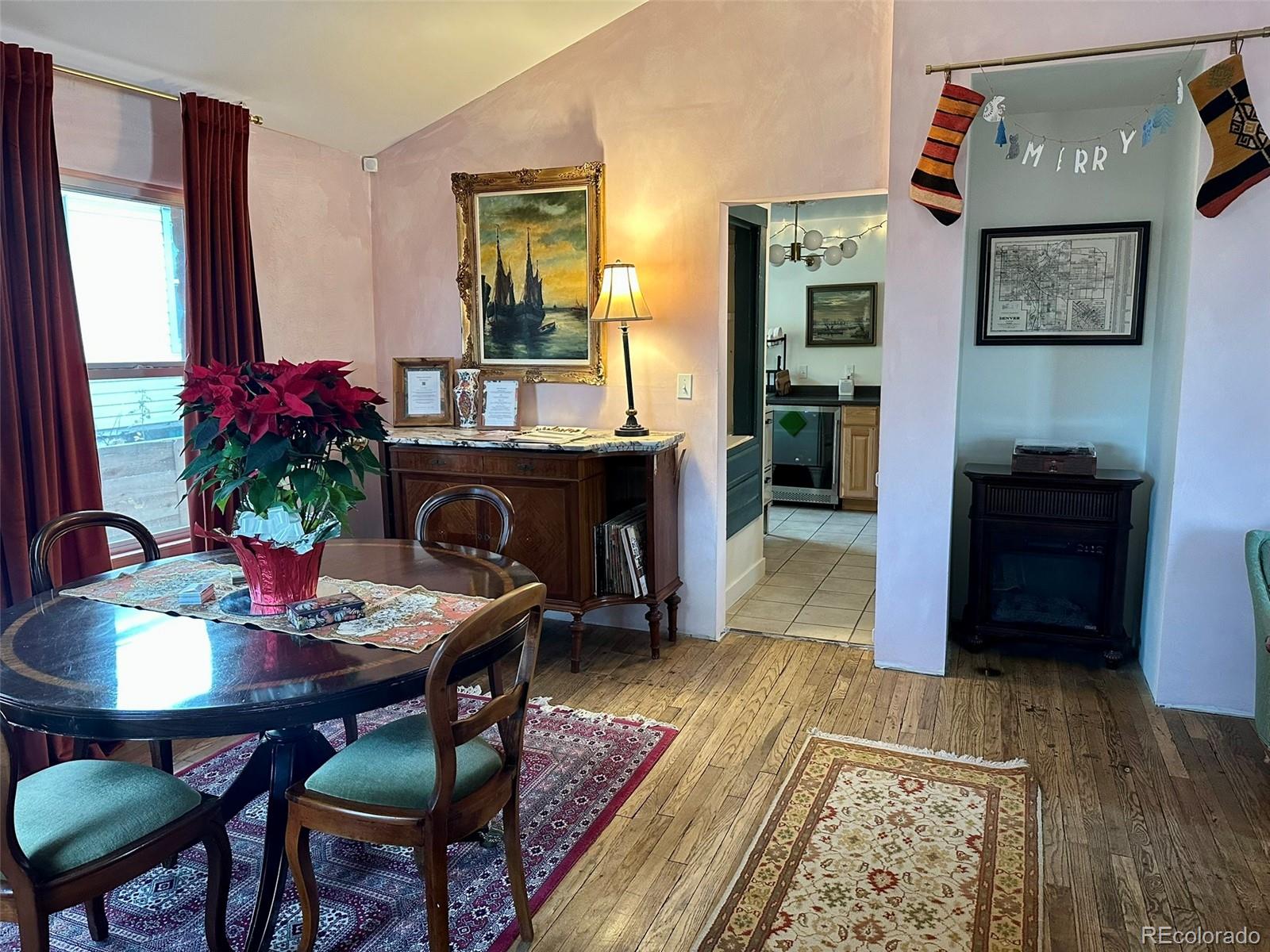 1047 Meade Street Denver, CO 80204 - Photo 11 of 38 a dining room with furniture and window