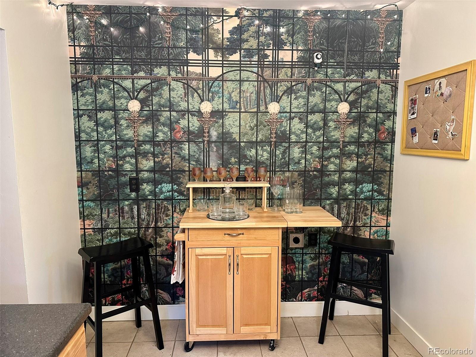 1047 Meade Street Denver, CO 80204 - Photo 14 of 38 a view of a room with a table and chairs