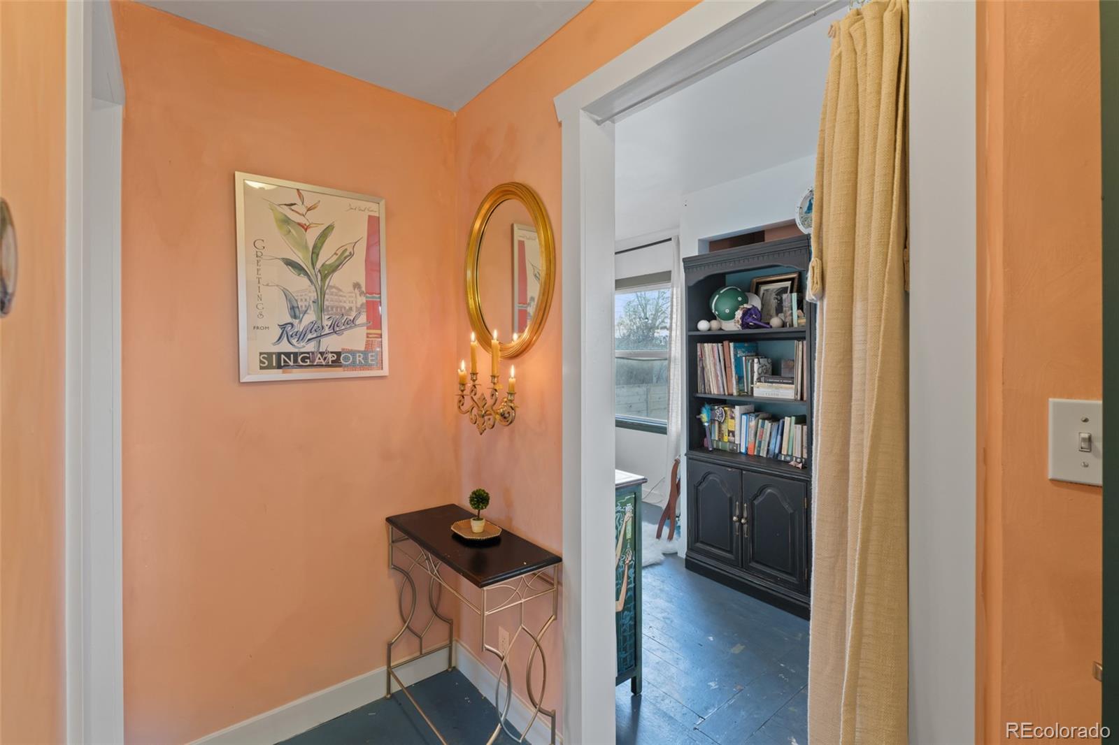 1047 Meade Street Denver, CO 80204 - Photo 22 of 38 a view of room with workspace and wooden floor