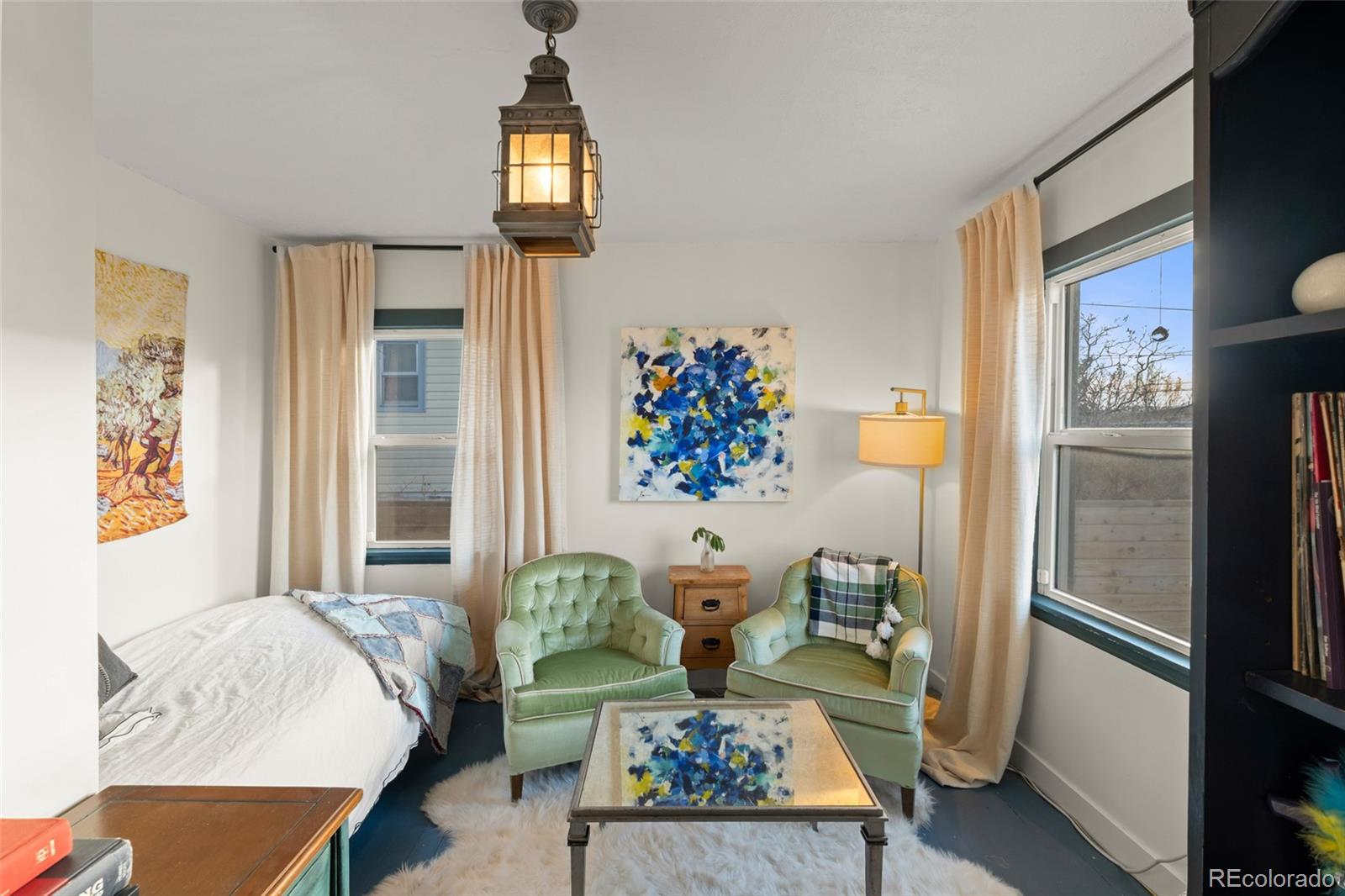 1047 Meade Street Denver, CO 80204 - Photo 23 of 38 a living room with furniture and a window