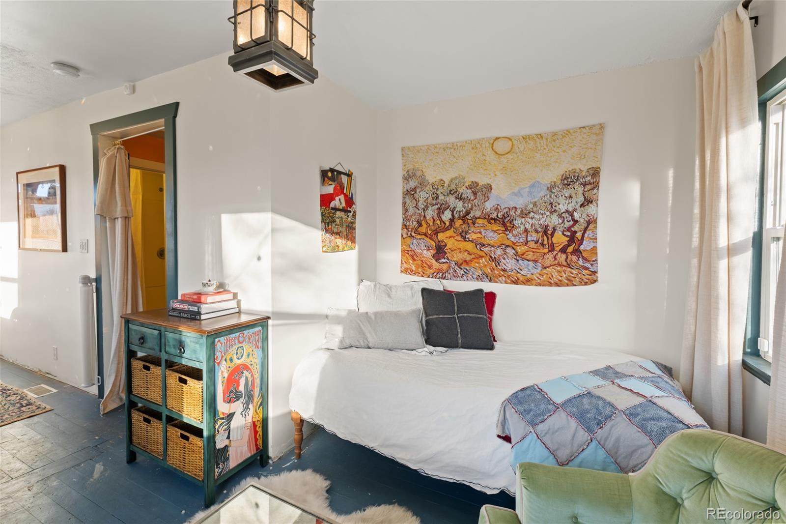 1047 Meade Street Denver, CO 80204 - Photo 25 of 38 a living room with furniture and a window