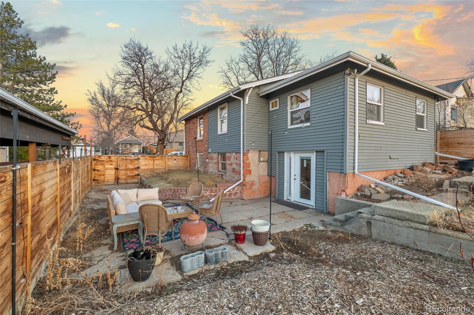 1047 Meade Street Denver, CO 80204 - Photo 34 of 38 a view of a house with a patio