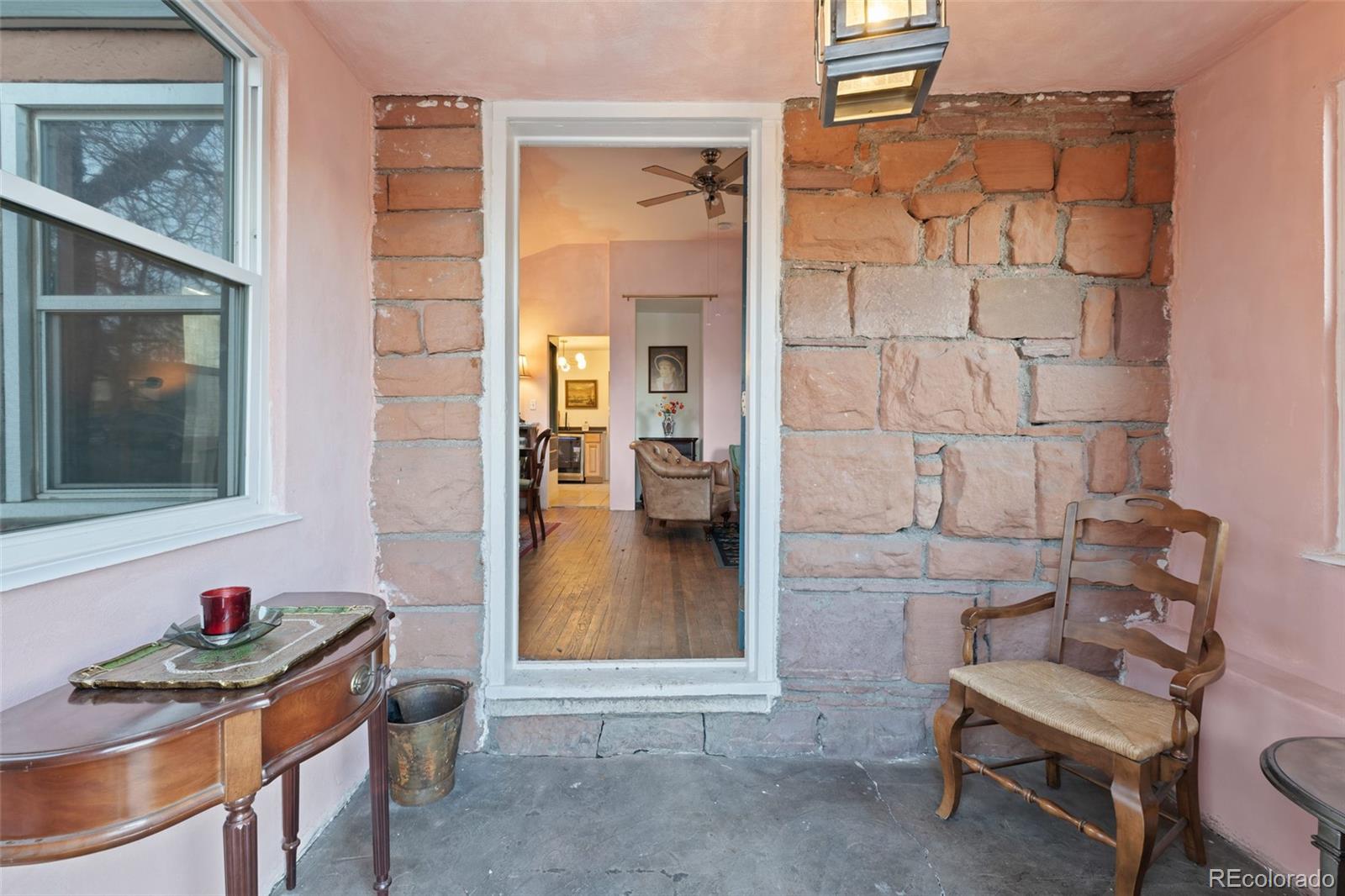 1047 Meade Street Denver, CO 80204 - Photo 5 of 38 a bathroom with a sink and a mirror