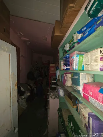 a view of a backyard with sitting area