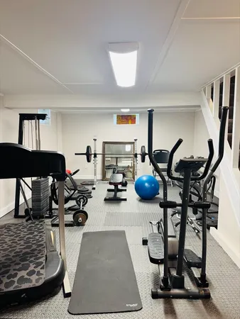 a view of a room with gym equipment