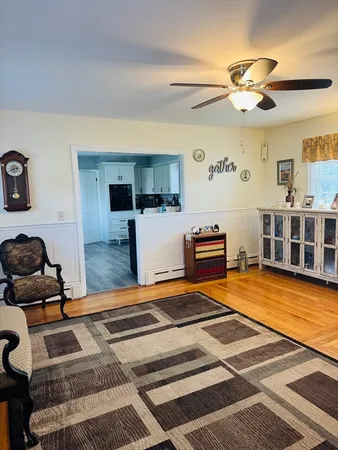 a bedroom with furniture and a chandelier