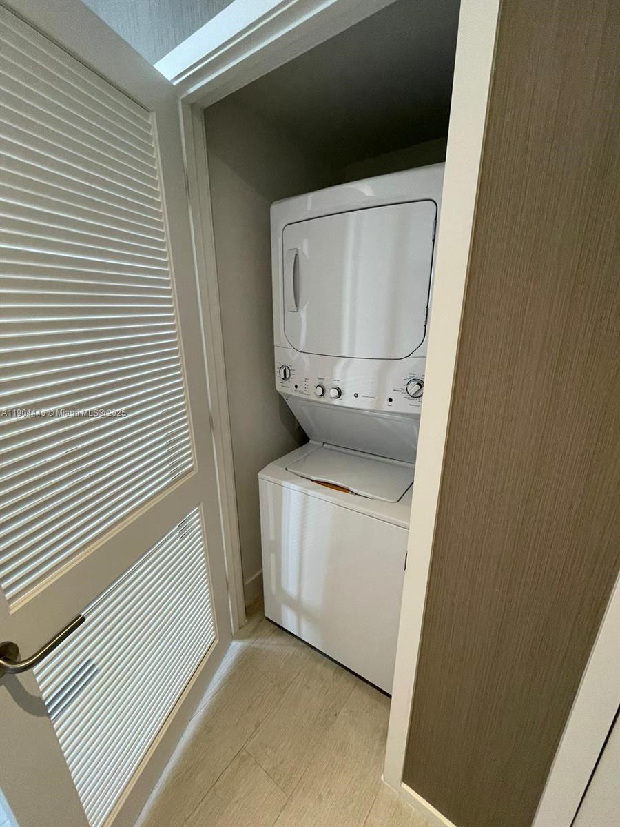 4010 South Ocean Drive, Unit R3306 Hollywood, FL 33019 - Photo 4 of 7 a utility room with dryer and washer