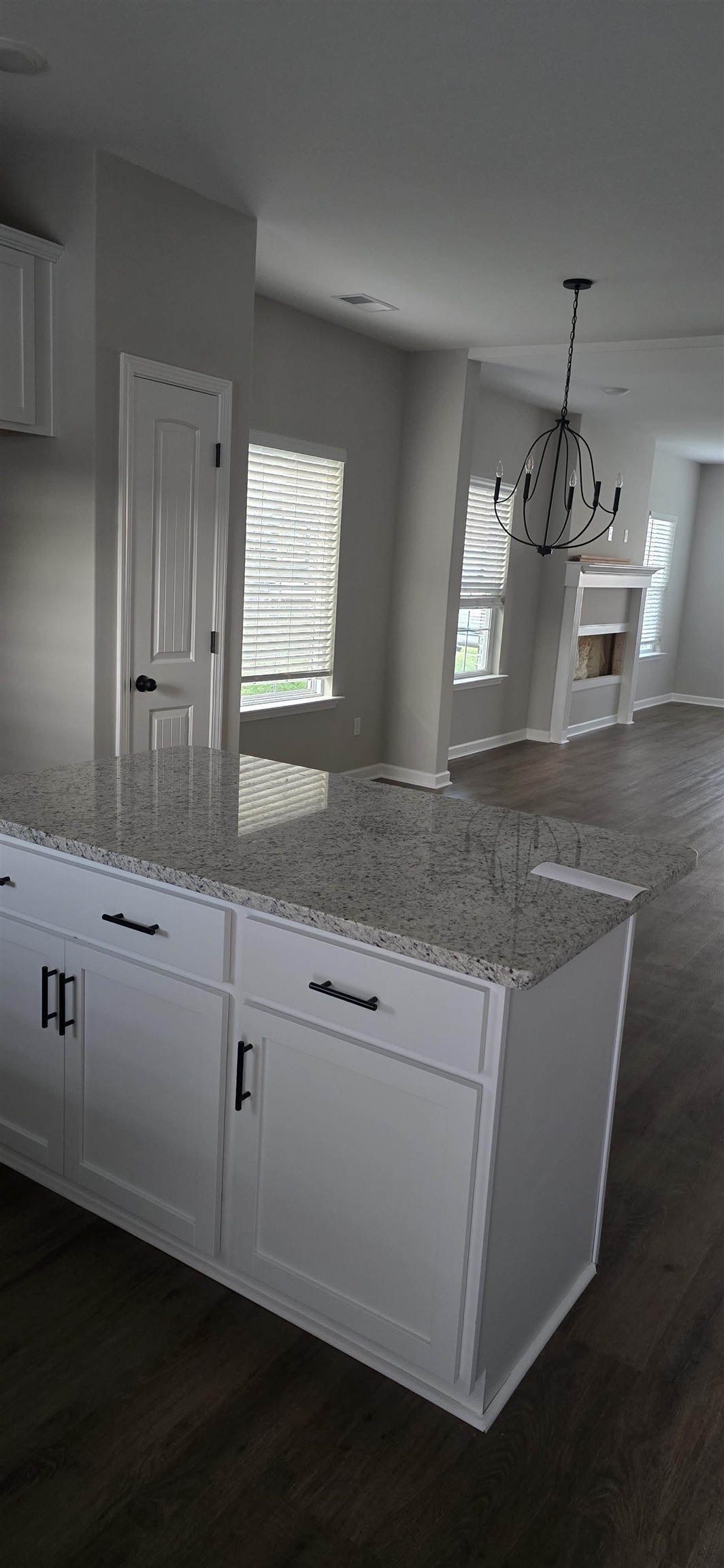 10148 Sterling Ridge Drive Cordova, TN 38018 - Photo 3 of 39 a kitchen with stainless steel appliances granite countertop a sink a stove and a wooden floors