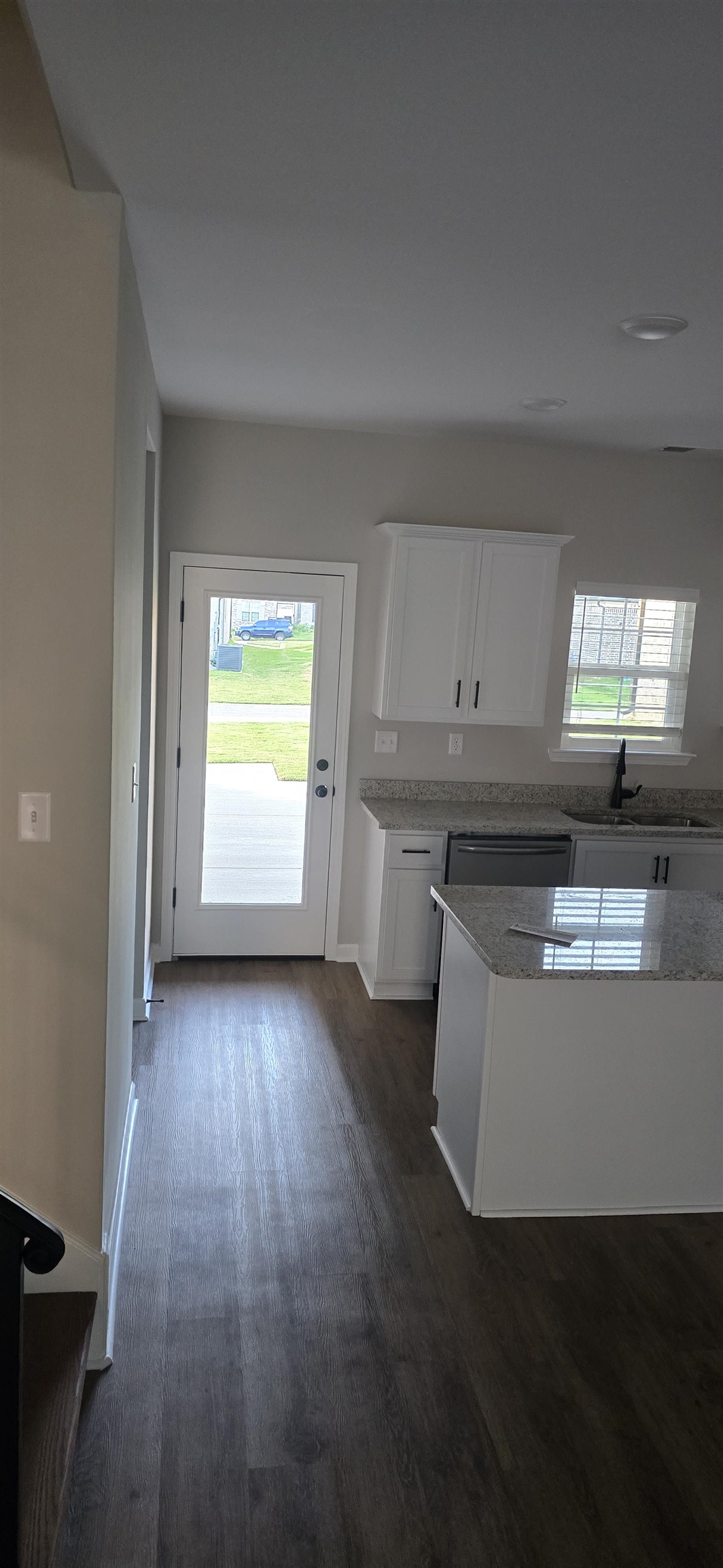 10148 Sterling Ridge Drive Cordova, TN 38018 - Photo 9 of 39 a kitchen with kitchen island stainless steel appliances a sink window and cabinets