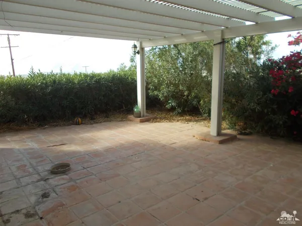 a view of backyard with green space