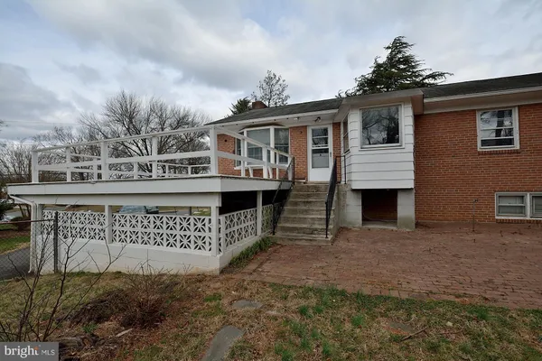 a front view of a house with a garage