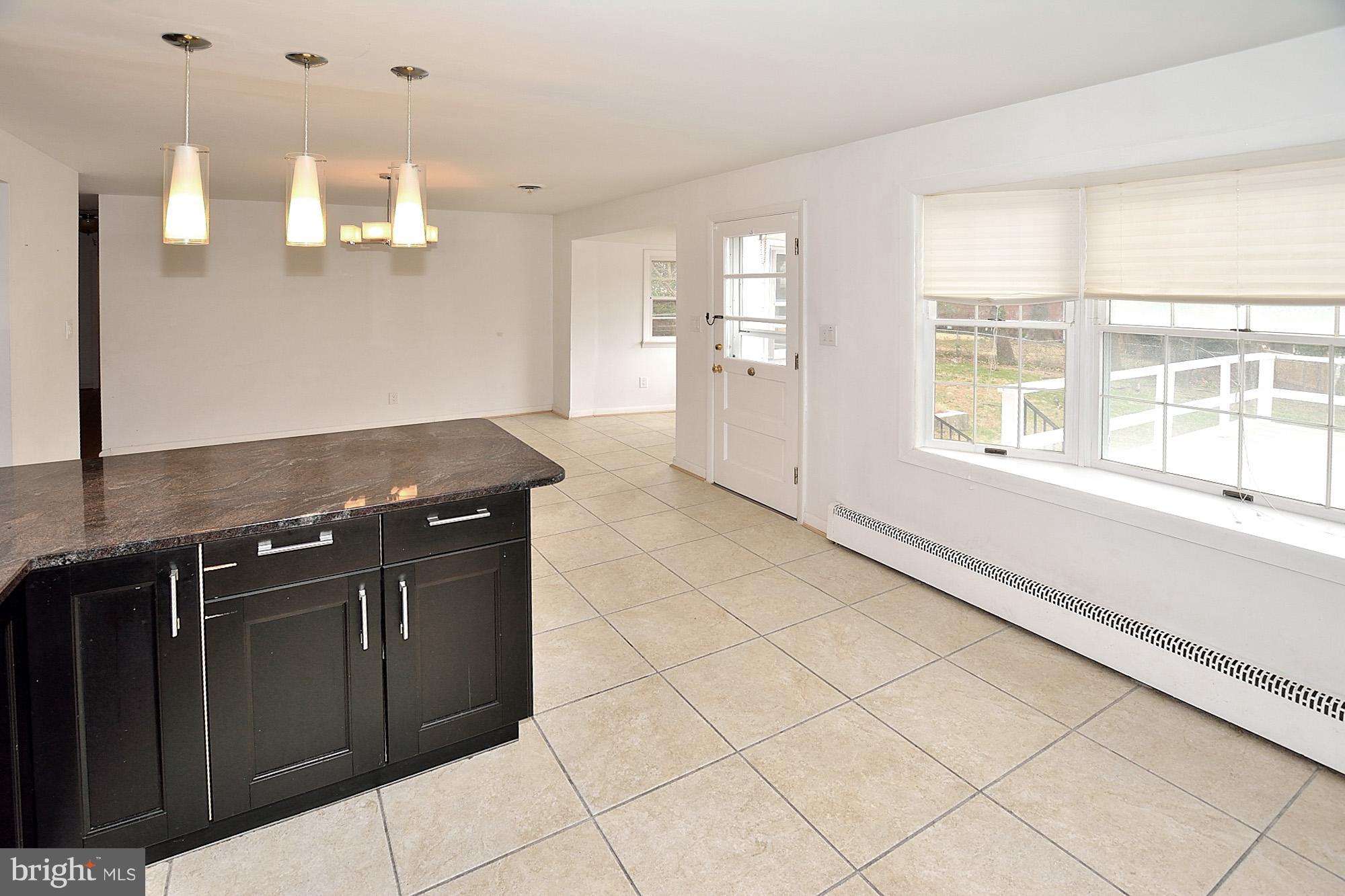 6149 Loch Raven Drive McLean, VA 22101 - Photo 6 of 29 Kitchen Overlooking Sundeck
