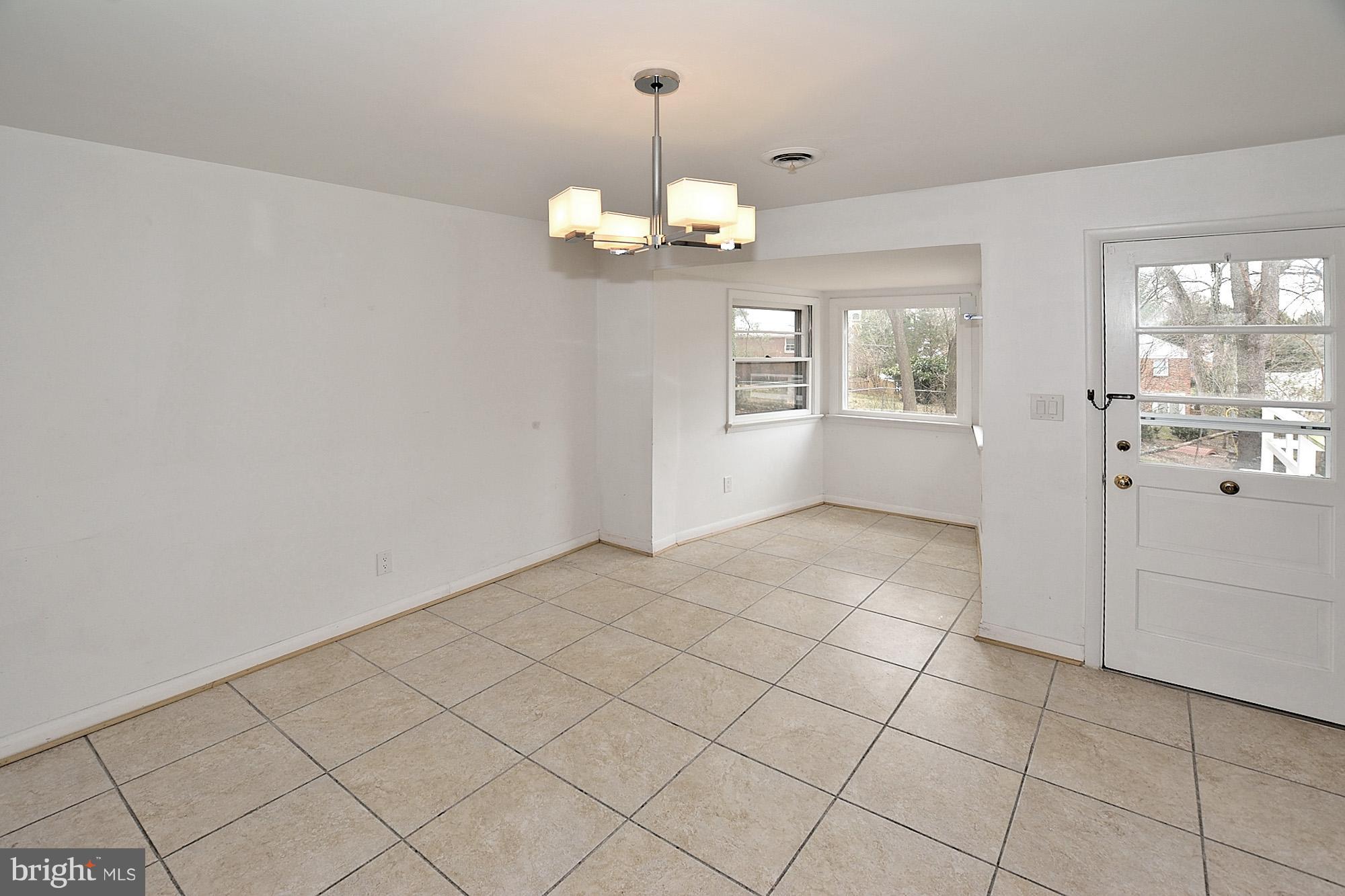 6149 Loch Raven Drive McLean, VA 22101 - Photo 7 of 29 Dining Room Overlooking Yard