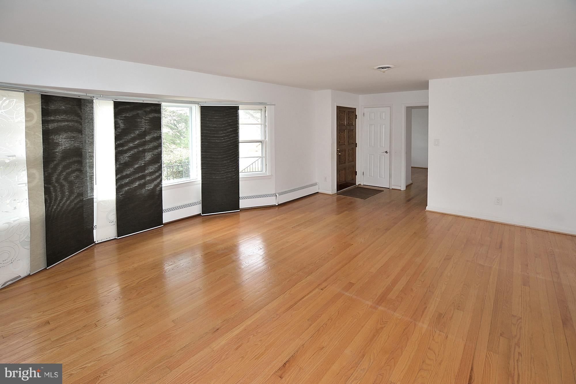 6149 Loch Raven Drive McLean, VA 22101 - Photo 8 of 29 Living Room w/Designer Shades