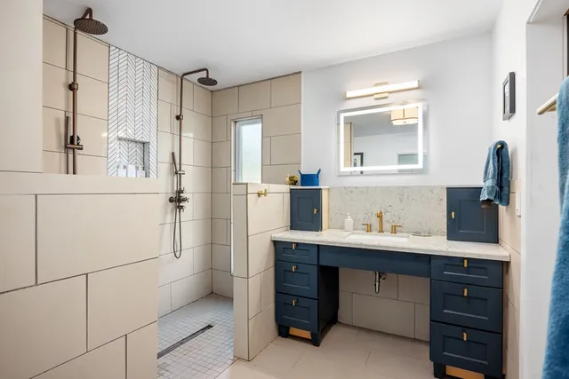 a kitchen with a sink and a refrigerator